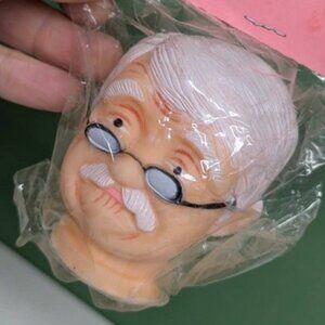Vintage old man doll head